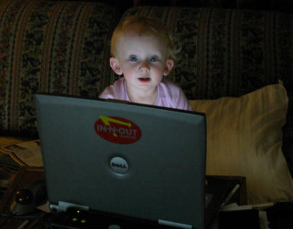 Kaitlyn using the laptop - original